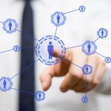 Man pushing button of network of people © Thinkstock