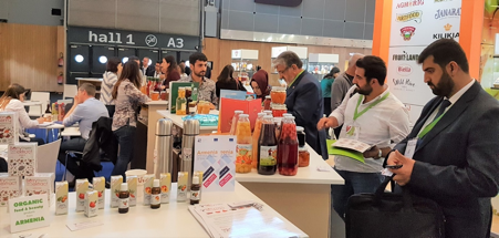 Armenian companies present their products to business representatives visiting the Armenia booth at SIAL Paris.