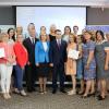 Aneil Singh, Head of Cooperation at the EU Delegation to the Republic of Moldova, Iulia Costin Secretary of State of the Ministry of Economy and Petru Gurgurov, Interim General Manager of ODIMM, with beneficiaries of the Business Academy for Women programme